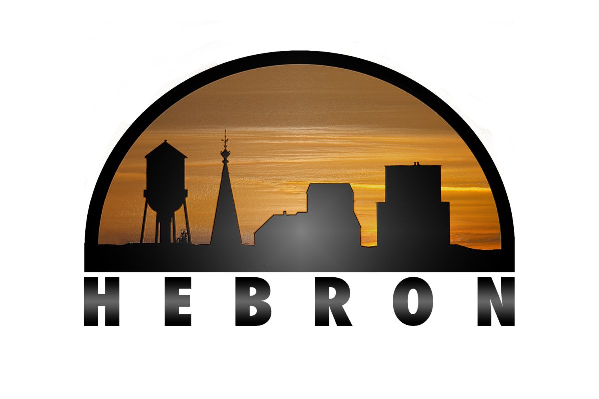 Hebron Logo Window opening onto night view of city